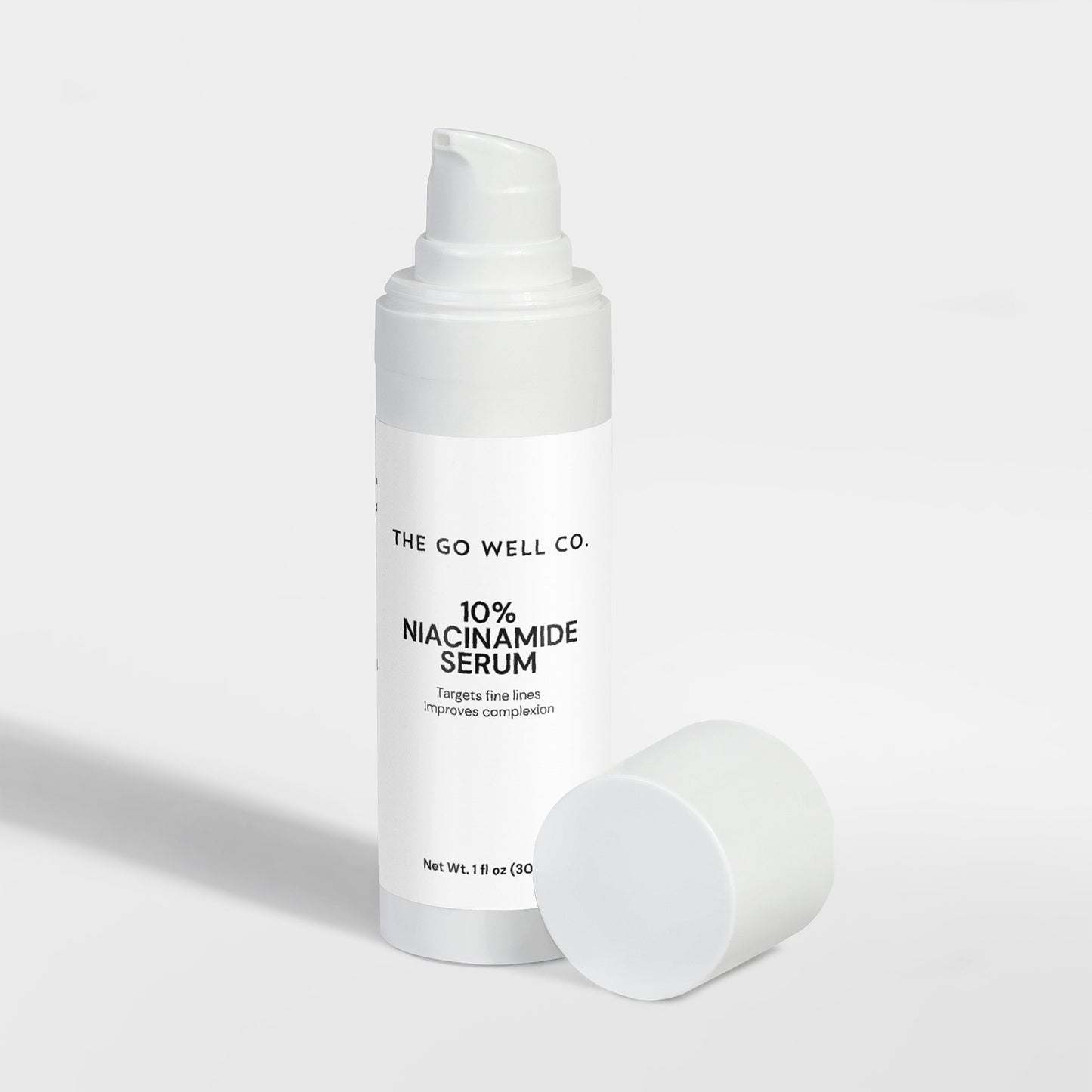 The Go Well Co. 10% Niacinamide Serum bottle on a white background