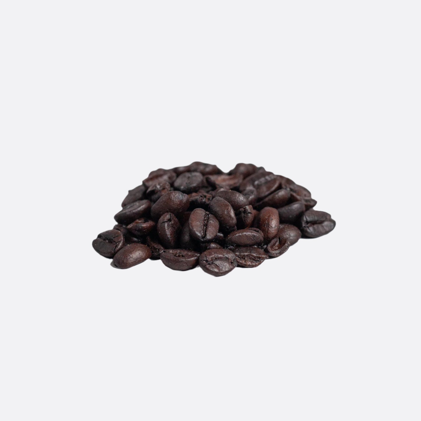 Pile of coffee beans on a white background