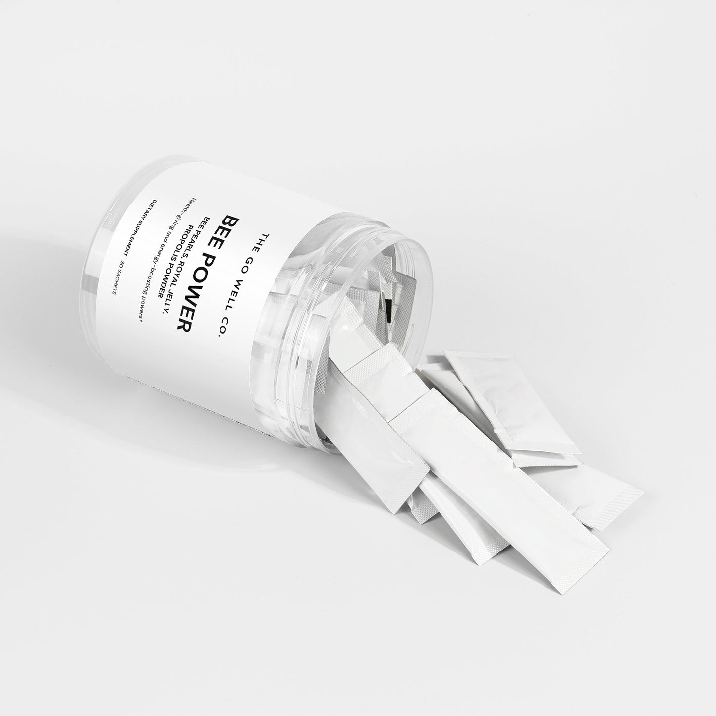 Clear container with white strap labeled 'Bee Power' on a light gray background