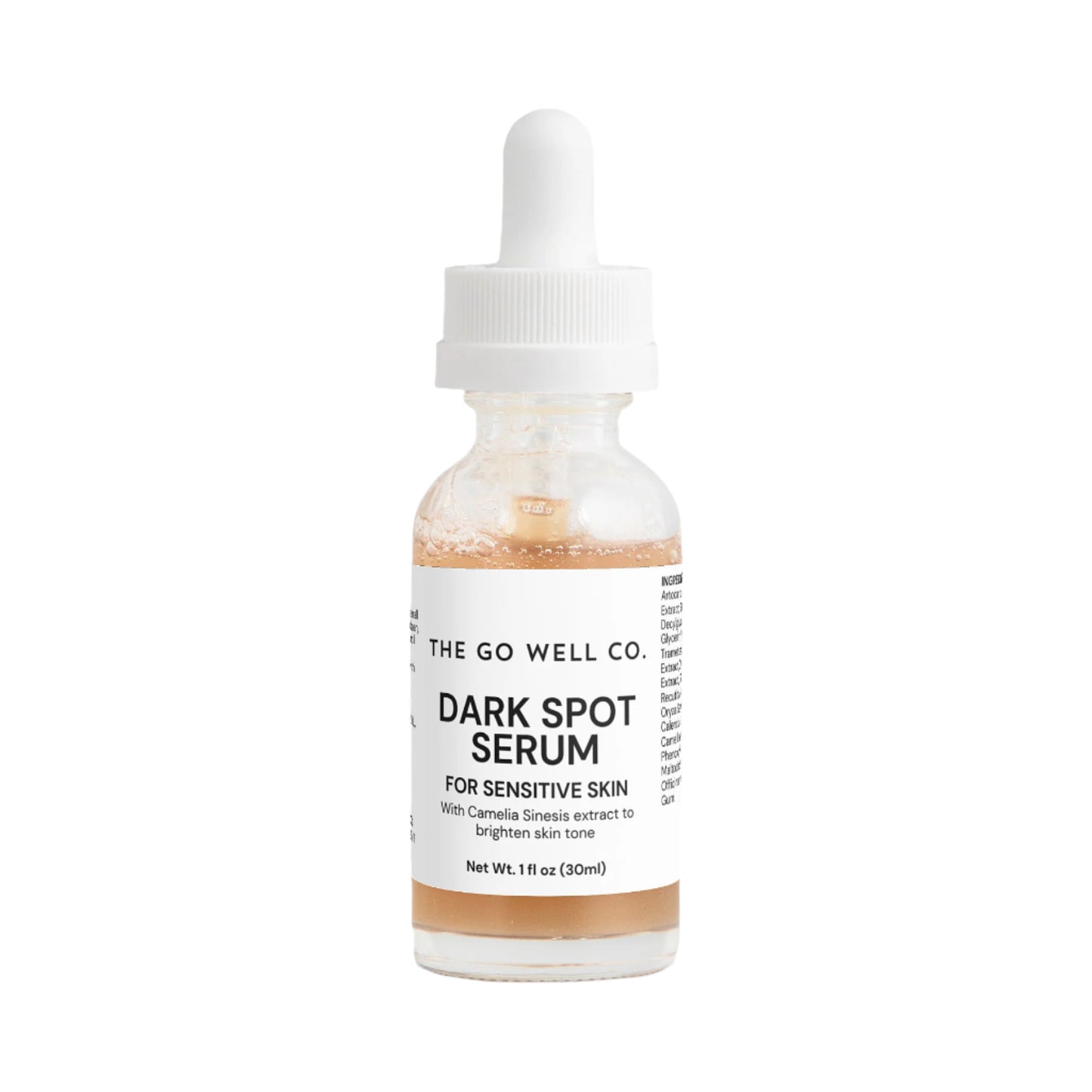 Dark spot serum bottle with dropper labeled 'The Go Well Co.' on a white background