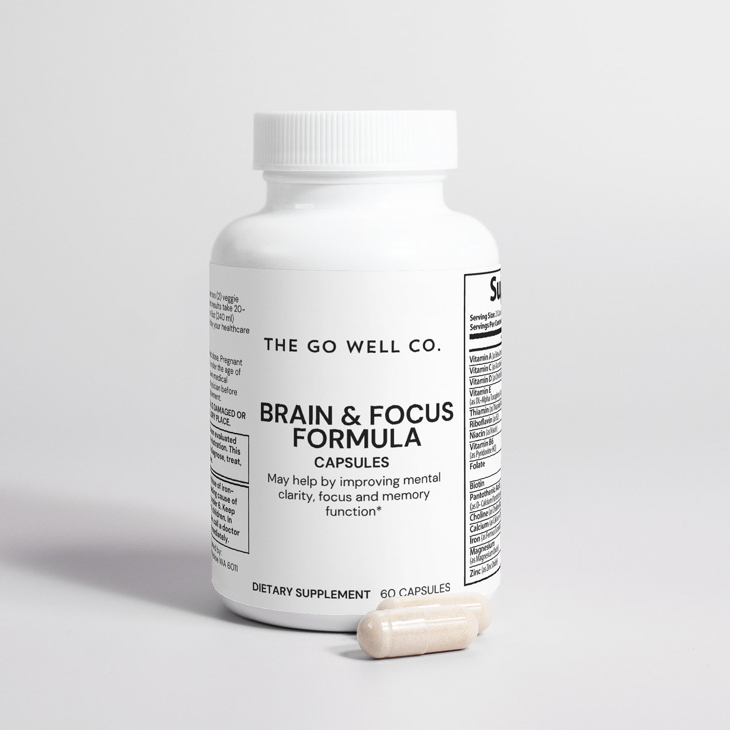 Supplement bottle labeled 'Brain & Focus Formula' from The Go Well Co. on a light gray background