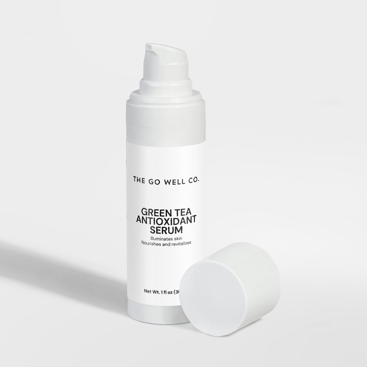 White serum bottle with 'The Go Well Co.' label on a light gray background