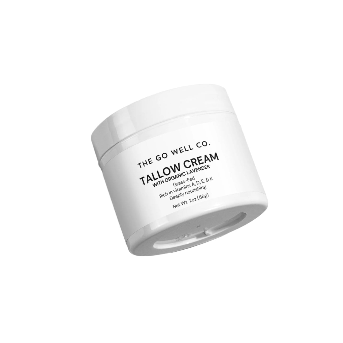 Jar of Tallow Cream from The Go Well Co. on a light gray background
