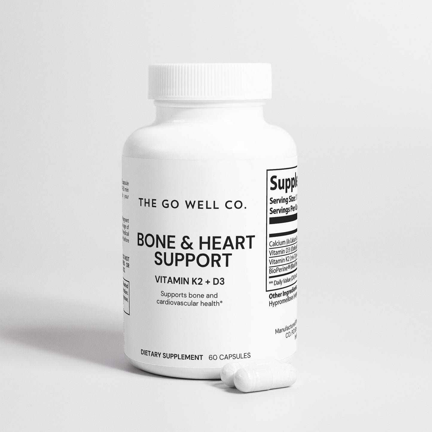 Supplement bottle labeled 'Bone & Heart Support' from The Go Well Co. on a light gray background
