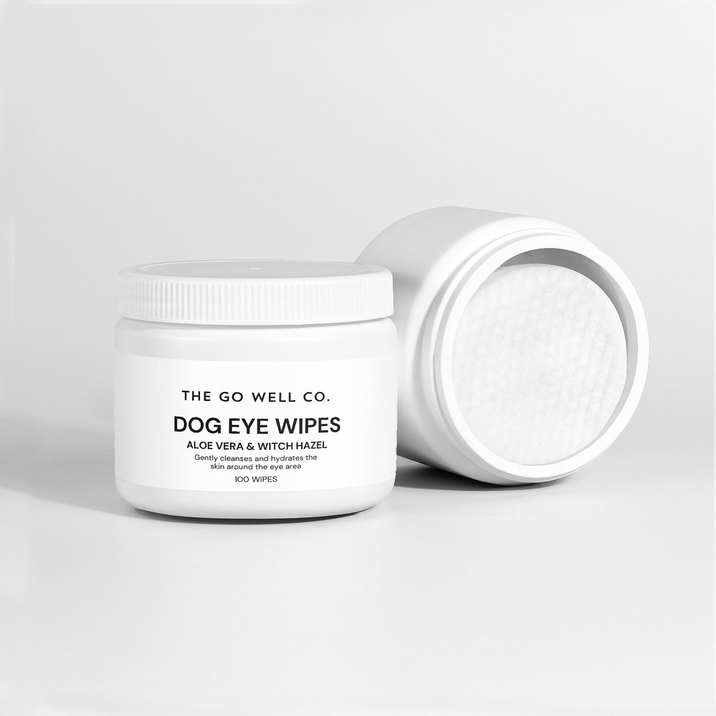 Dog eye wipes container with lid open on a light gray background