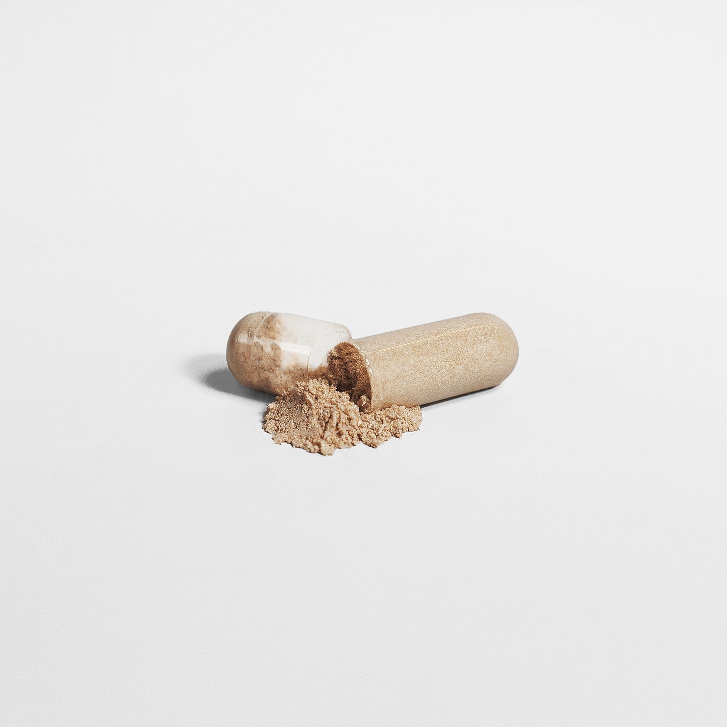 Split capsule showing a vitamin powder