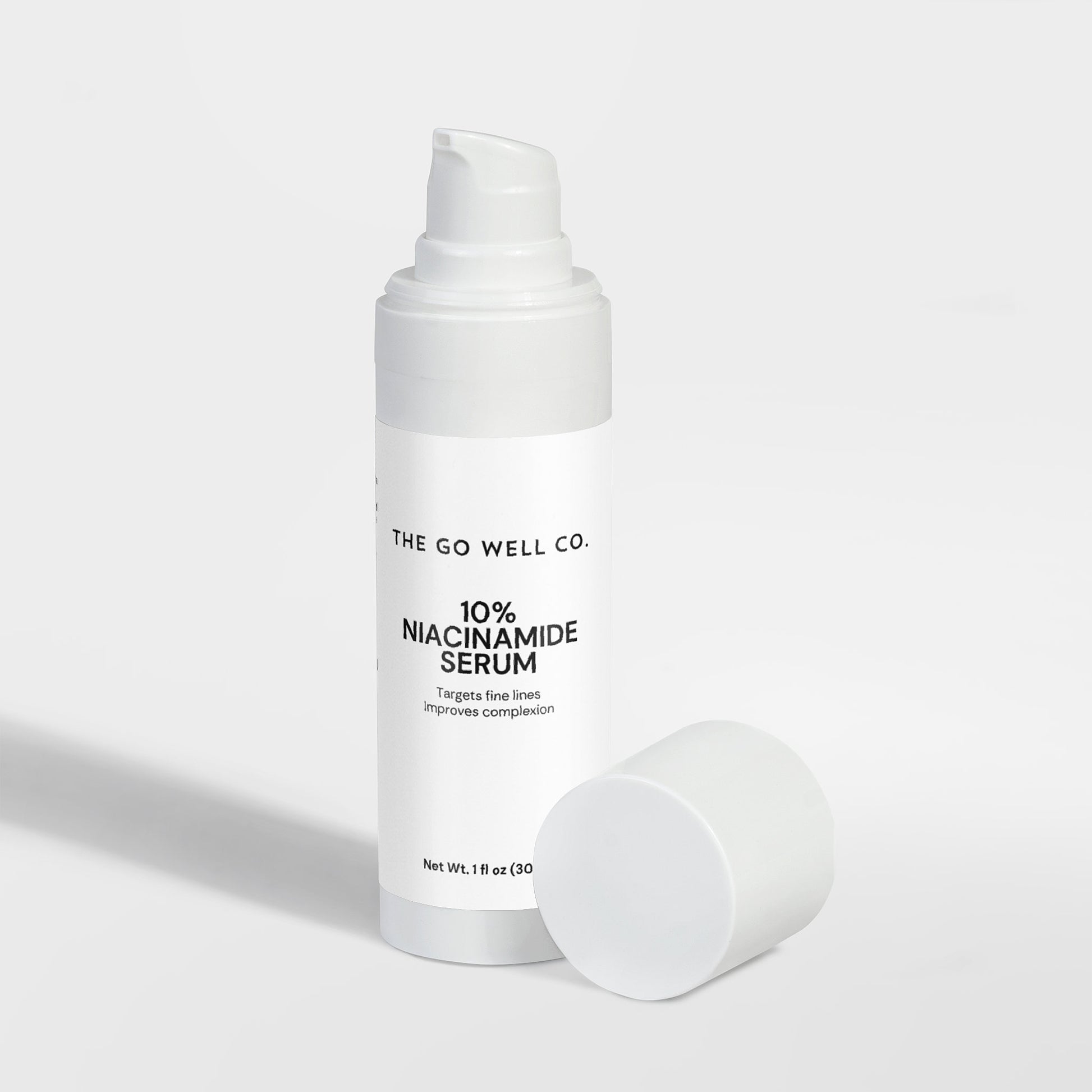 The Go Well Co. 10% Niacinamide Serum bottle on a white background