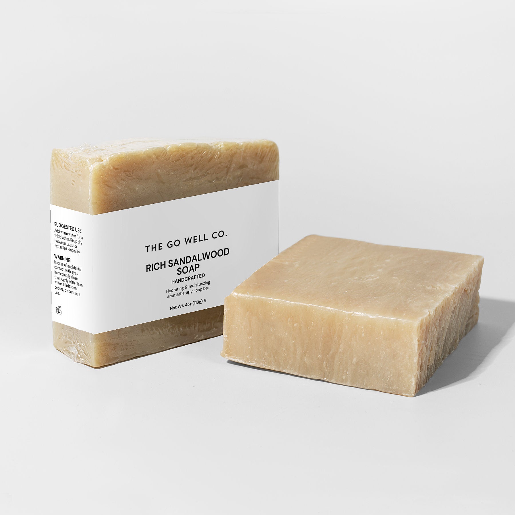 A block of 4oz Sandalwood soap by The Go Well Co.