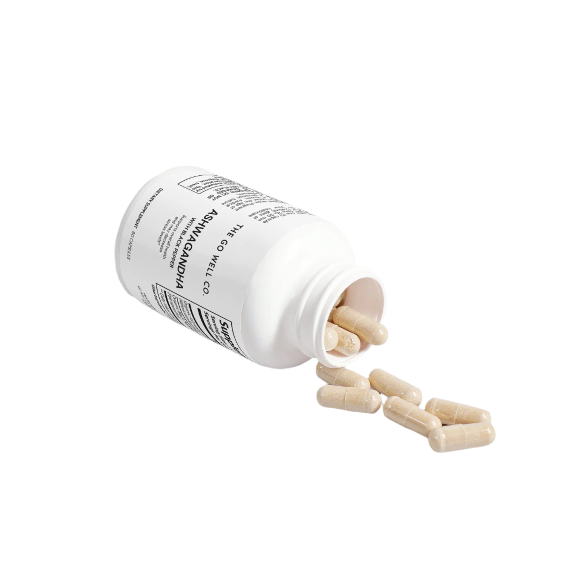 White supplement bottle with capsules spilling out on a light gray background