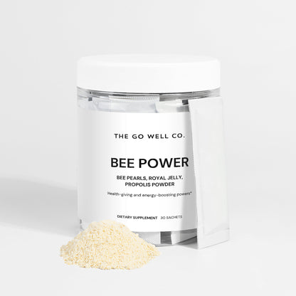 Container of 'Bee Power' powder from The Go Well Co. on a white background