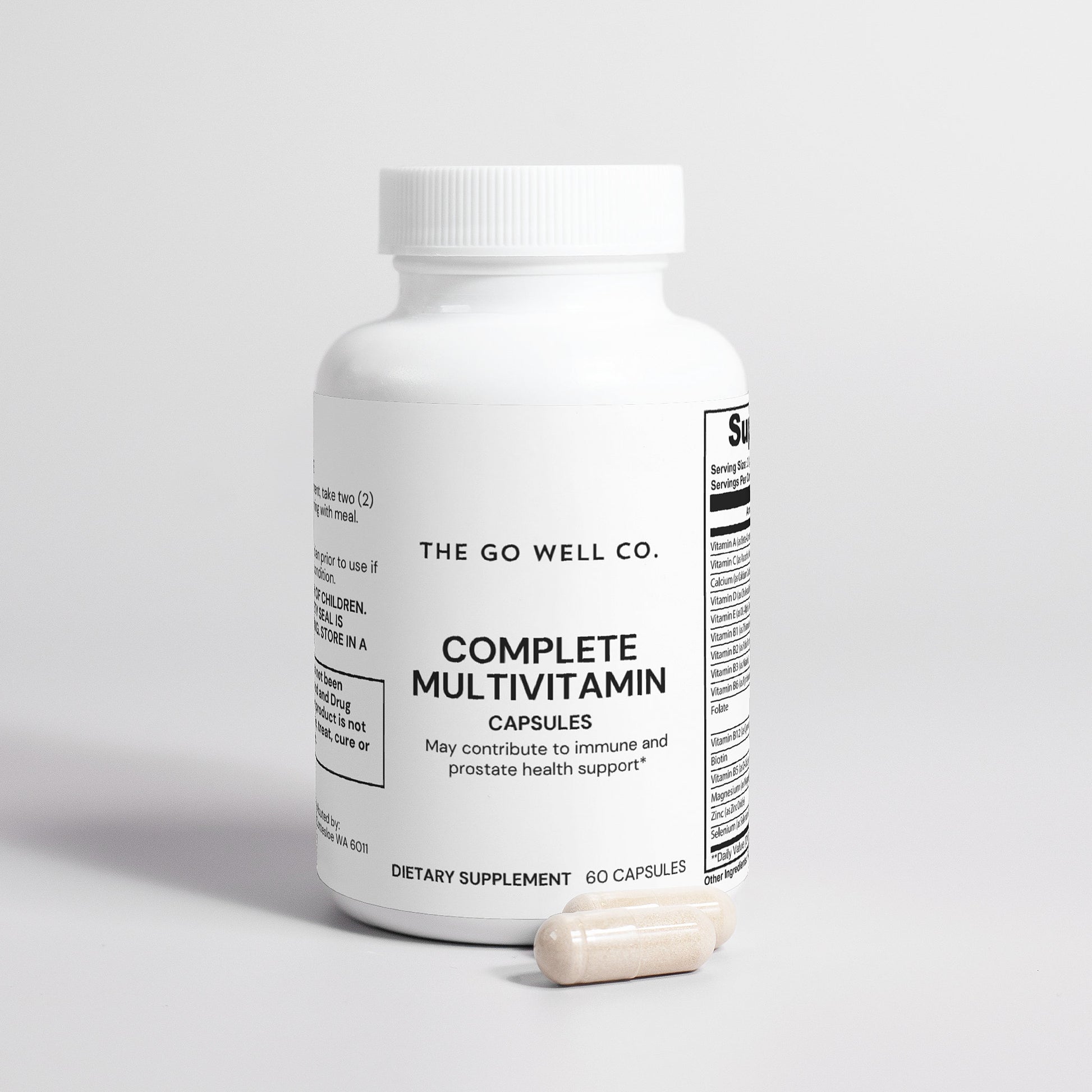 White bottle of 'The Go Well Co.' Complete Multivitamin on a light gray background