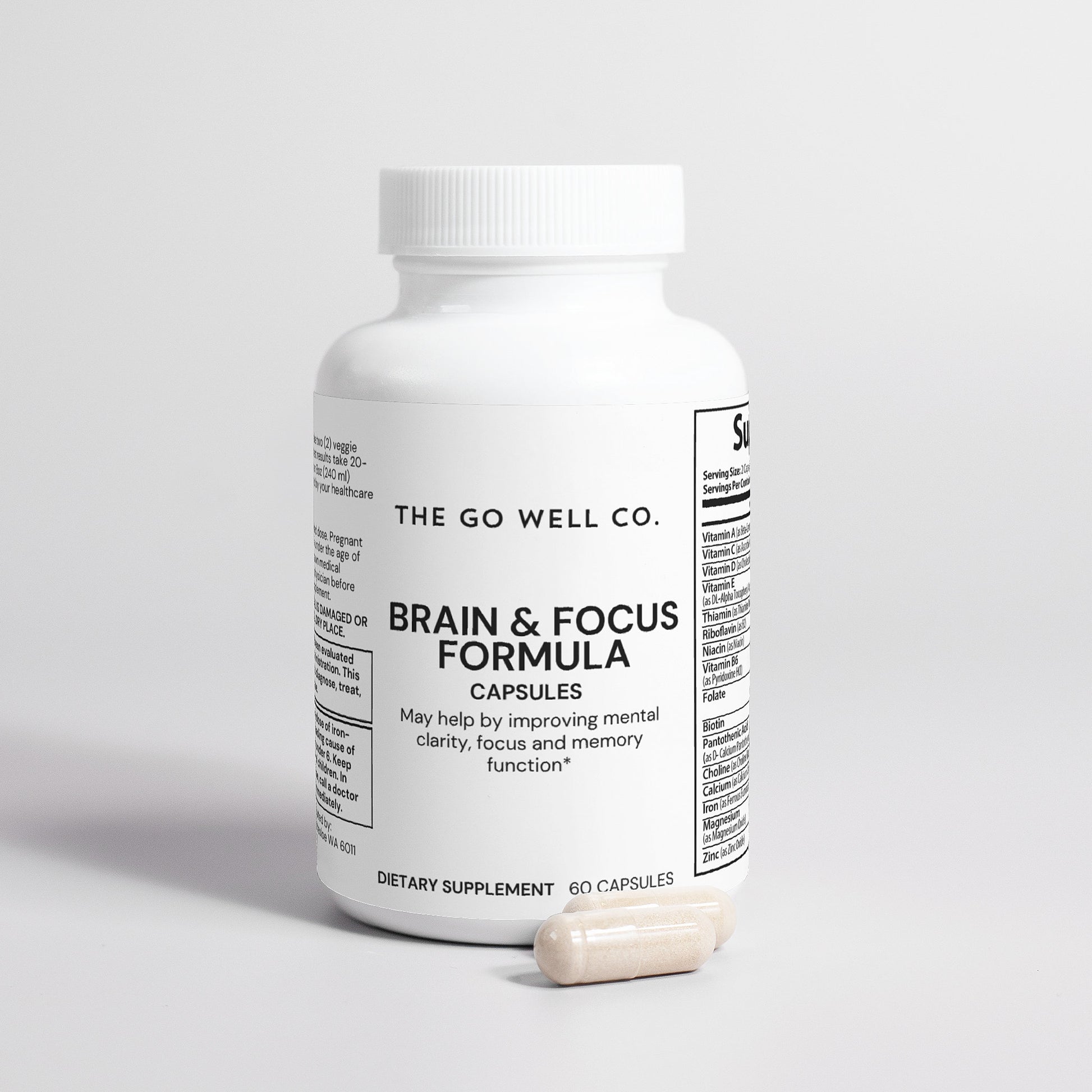 Supplement bottle labeled 'Brain & Focus Formula' from The Go Well Co. on a light gray background