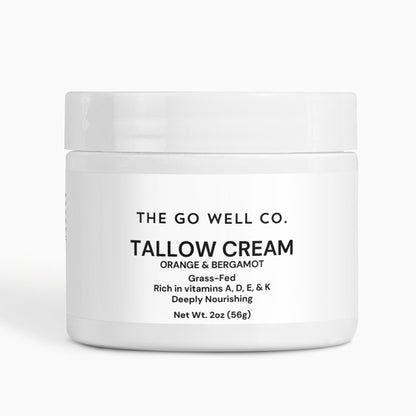 White jar of Tallow Cream from The Go Well Co. on a white background
