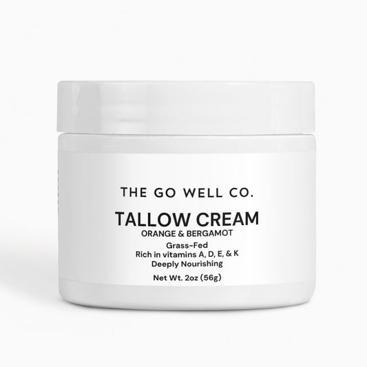 White jar of Tallow Cream from The Go Well Co. on a white background