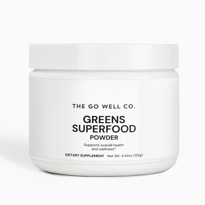 Jar of Greens Superfood Powder from The Go Well Co. on a white background