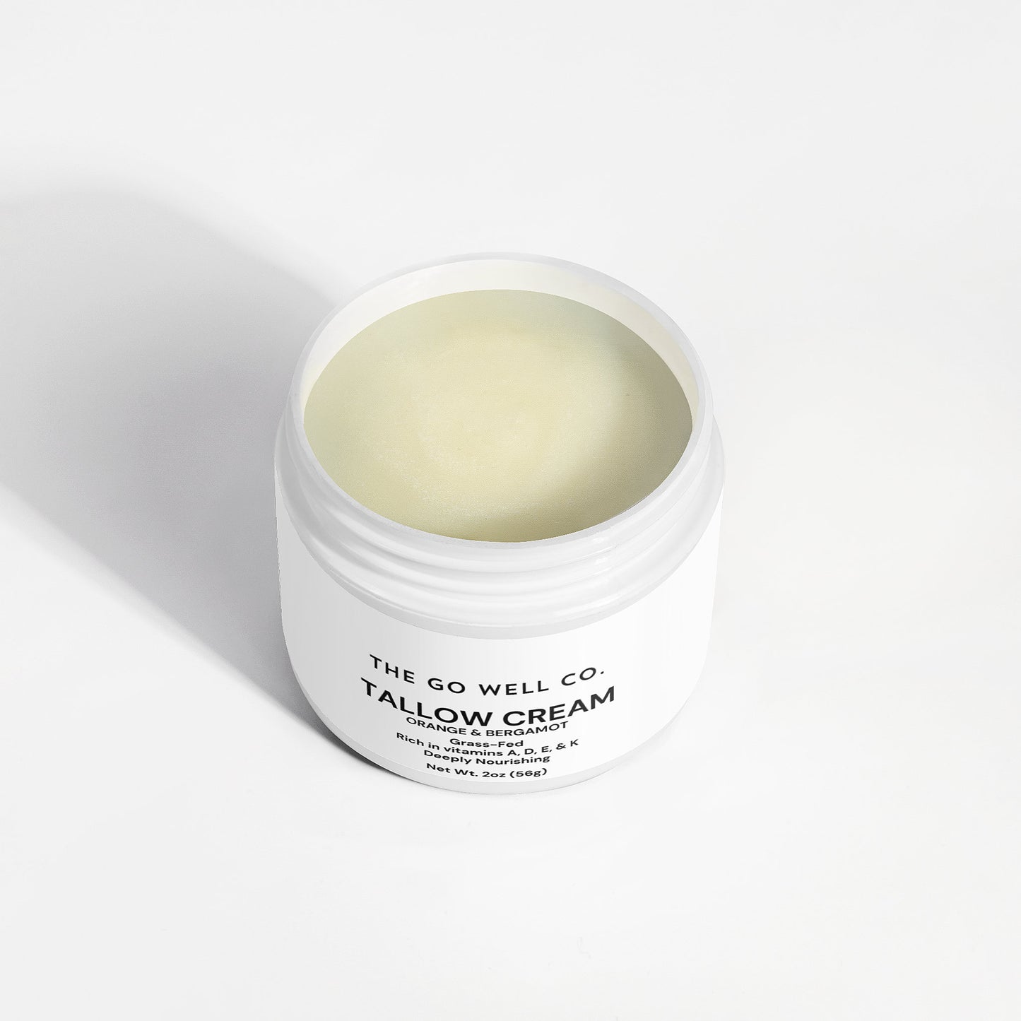 Jar of Tallow Cream from The Go Well Co. on a white background
