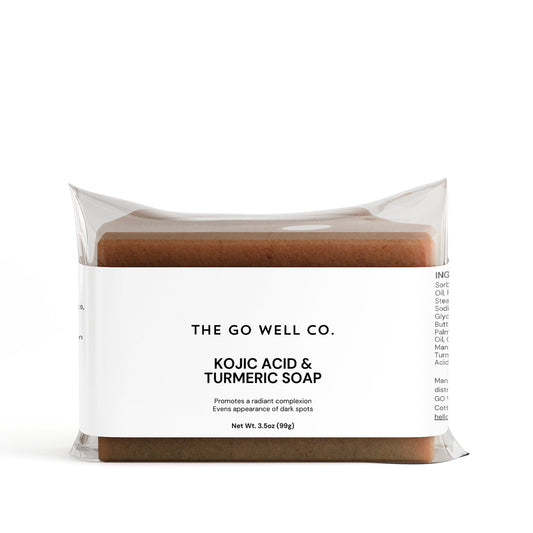 Kojic Acid & Turmeric Soap packaging from The Go Well Co. on a white background