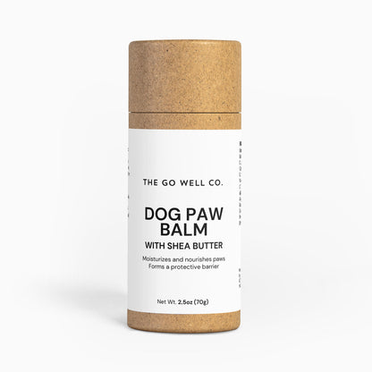 Dog paw balm container with 'The Go Well Co.' branding on a white background