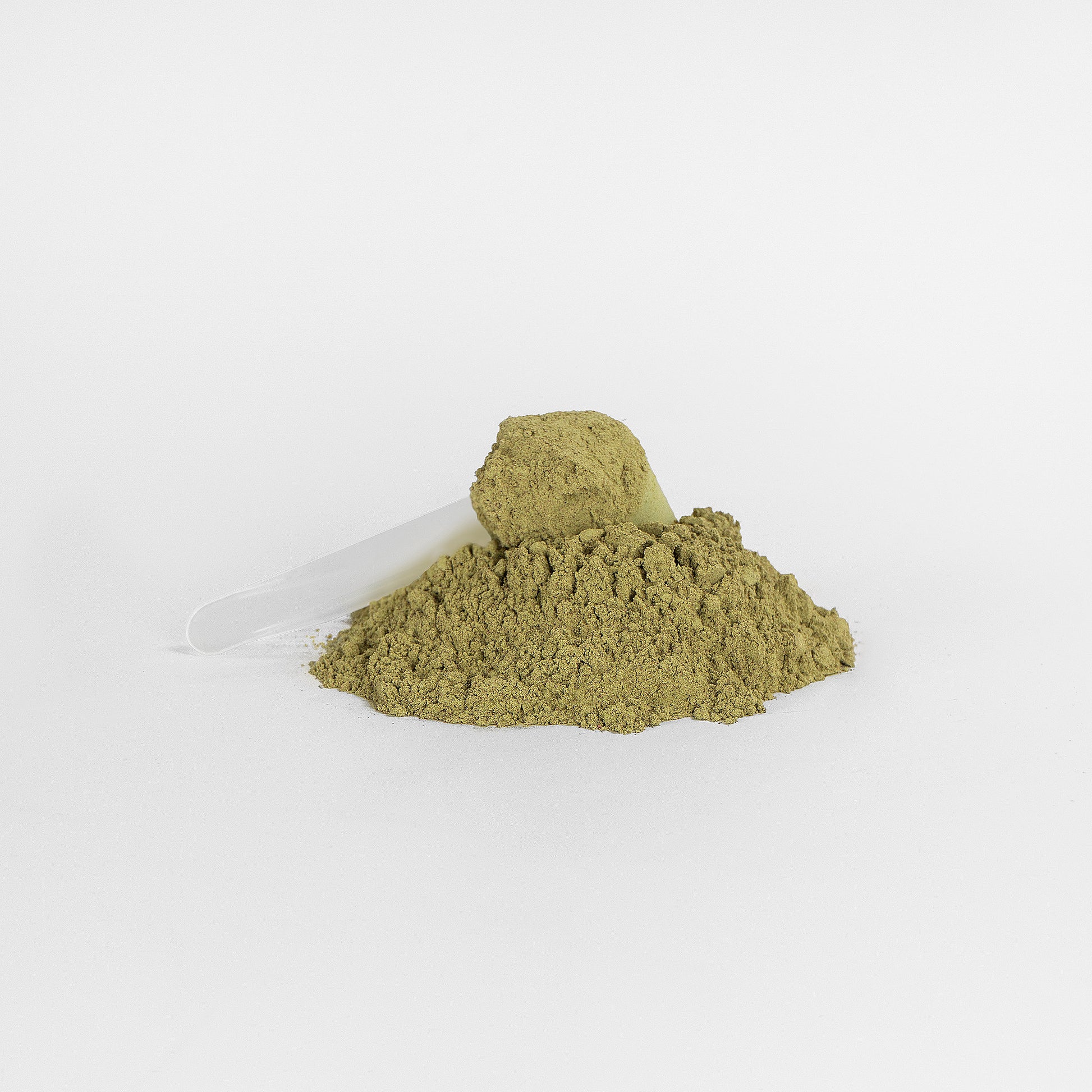 Green powder on a white background