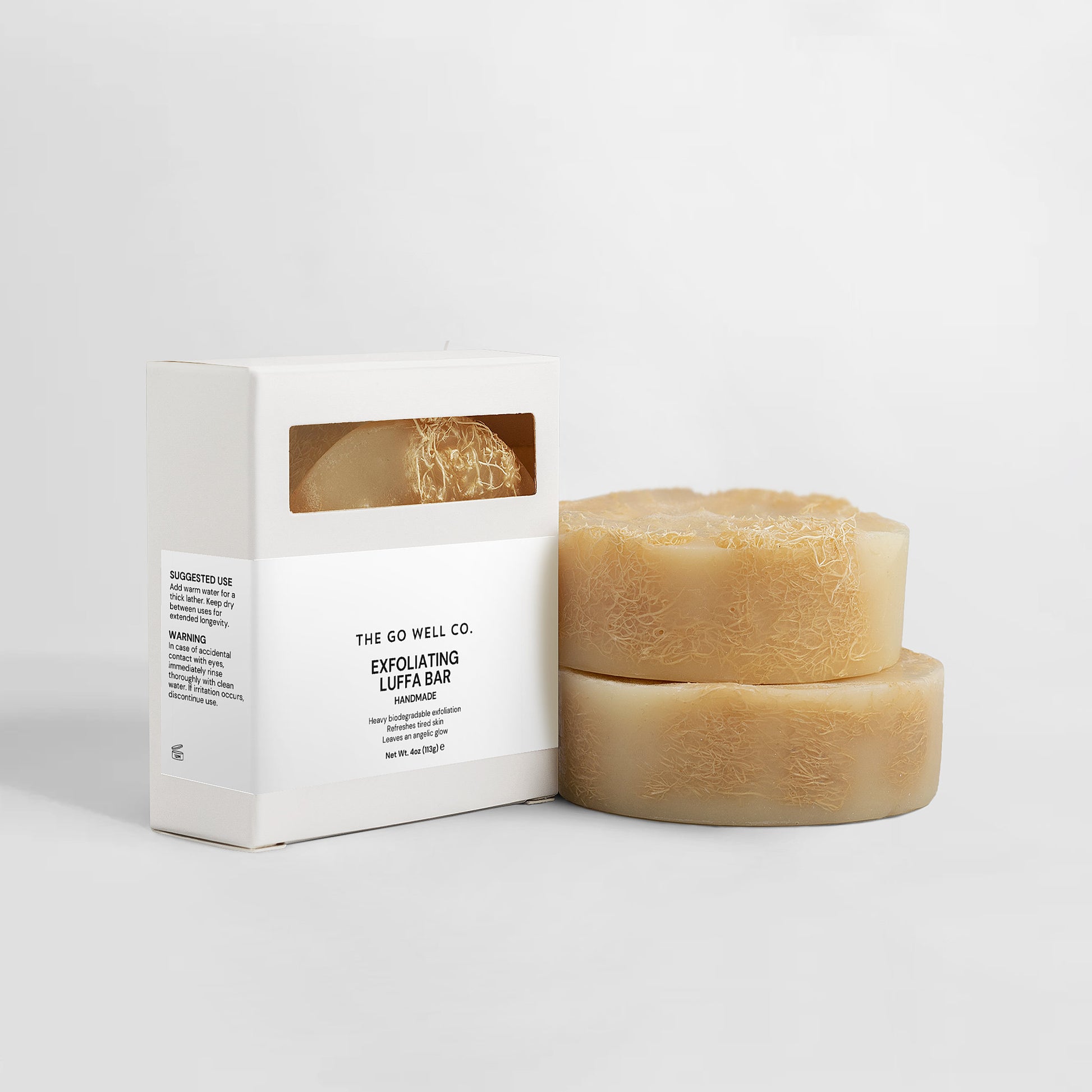 Exfoliating Luffa Bar from The Go Well Co. with packaging on a white background