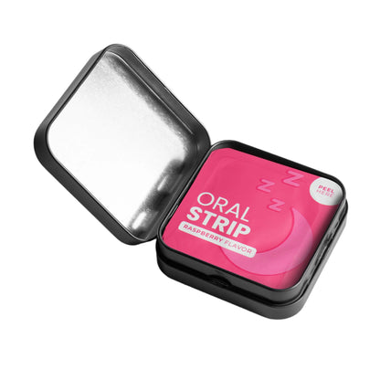 Pink oral strip in a black tin with 'Oral Strip' text on a light gray background