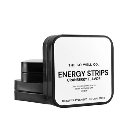Black and white packaging of The Go Well Co. Energy Strips with cranberry flavor on a white background