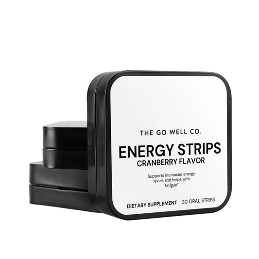 Black and white packaging of The Go Well Co. Energy Strips with cranberry flavor on a white background