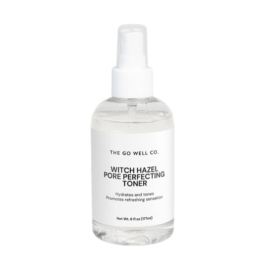 Bottle of Witch Hazel Pore Perfecting Toner from The Go Well Co. on a white background